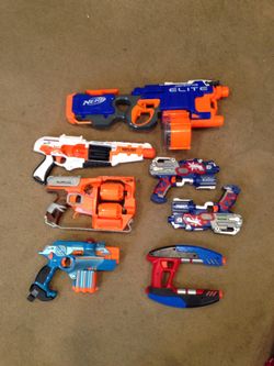 Assorted auto-fire and single fire nerf guns
