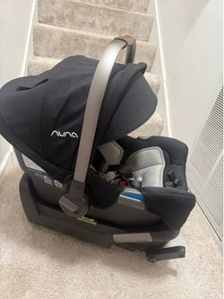 Nuna Infant Car Seat with Base - Excellent Condition • Premium Nuna brand • Safe, stylish, and lightweight design • Suitable for newborns • Soft infan