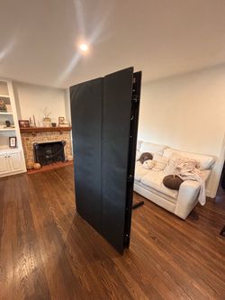 Bed frame with adjustable headrest