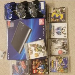 Ps3 super slim 500gb 3 controllers 7 games