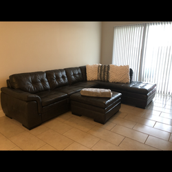 Like New Trevor Dark Gray Genuine Leather Large Right Bumper Sectional + Ottoman