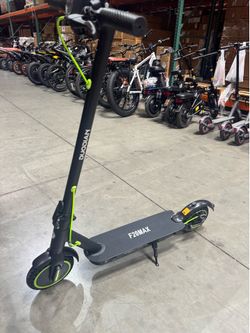 Electric scooter with shock absorption