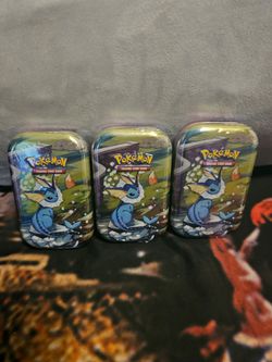 Pokemon Prismatic mini tins Vaporeon $30 each
