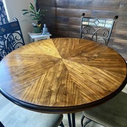 Round Wooden dining table with chairs