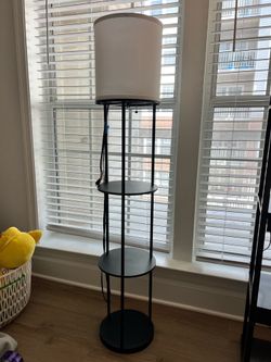 Floor lamp with shelving