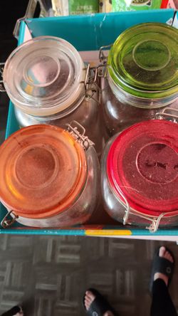 6 Tall Glass Jars With Different Color Lids