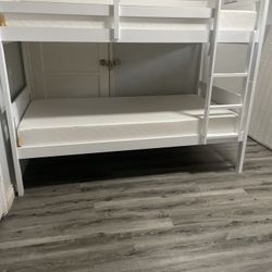 Twin over twin bunk bed. White or espresso. Assembly required. Assembly not included. Taxes included. Free delivery.  Bunk Bed only without Assembly-$