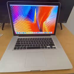 MacBook Pro 15 Inch With i7 And 16 Gigabytes Ram + 500 GB Storage 