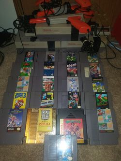 3 nintendos 3 guns an games sum.cords not included /270.00 cash