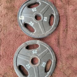 2" HOLE OLYMPIC PLATES 25LBs 
TOTAL 50LBs 
7111.S WESTERN WALGREENS 
$45. CASH ONLY AS IS