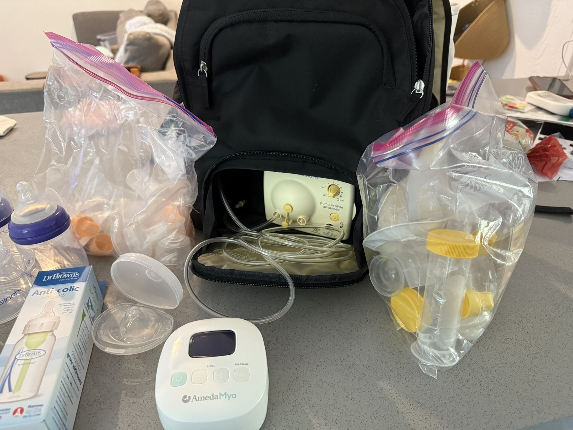 medela breast pump, and misc supplies