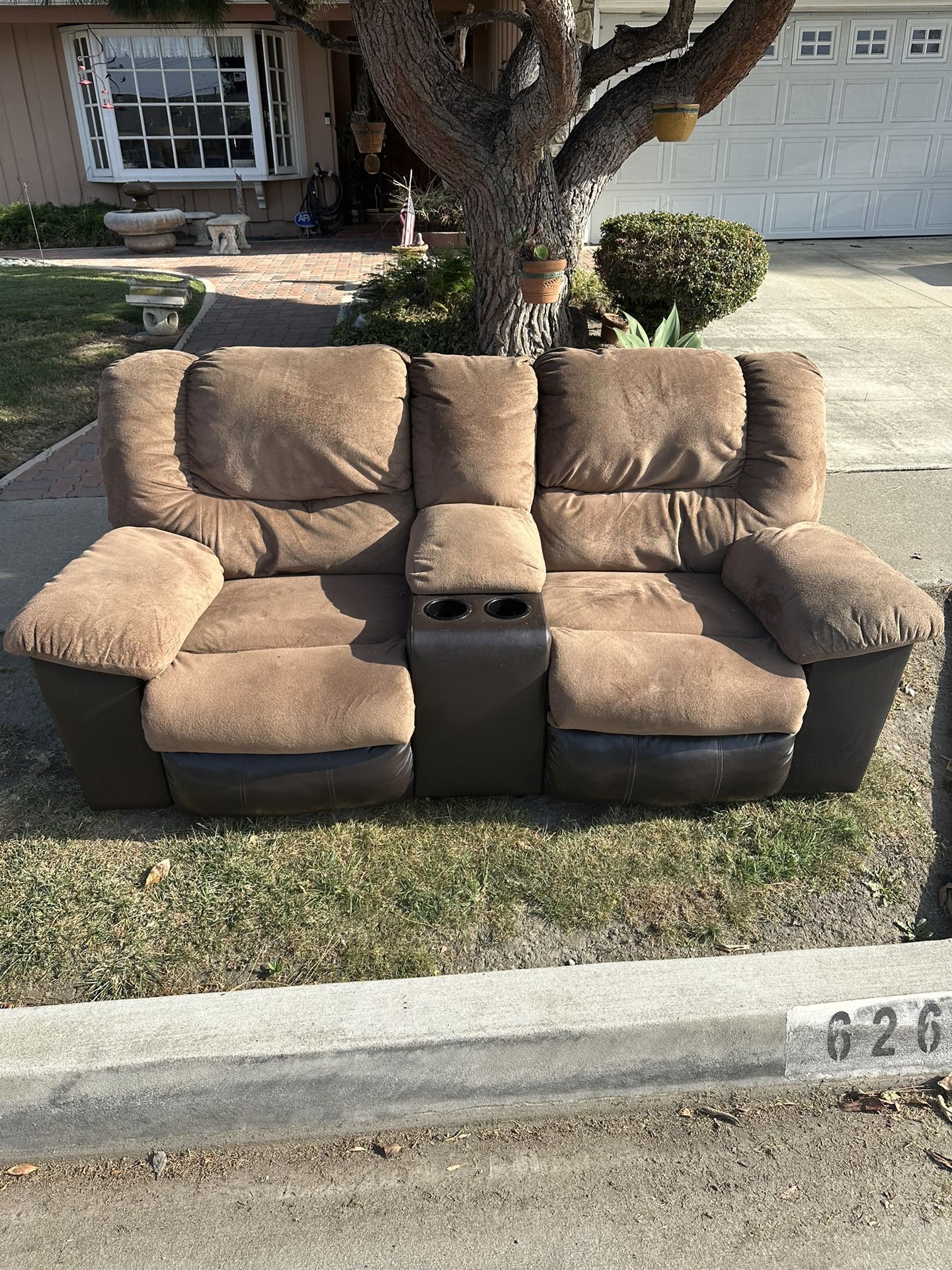 Signature Design by Ashley Earhart Reclining Loveseat with Console