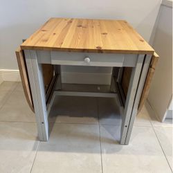 Folding dining table