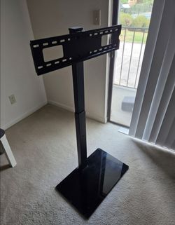 TV stand  - lightly used . Almost brand new $25 or OBO