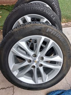 Stock Chevy Malibu rims and tires
