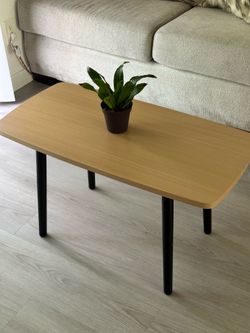 Coffee table with black legs