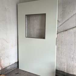 Heavy steel door