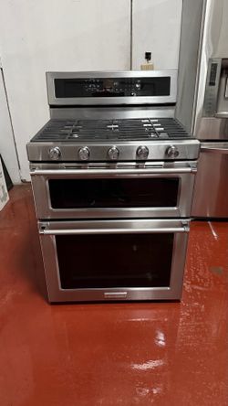 KitchenAid double oven gas stove with 5 burners in very good condition, working perfectly. We offer home delivery, installation, and a 3-month warrant