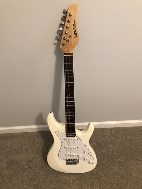 Assassin GE39 Electric Guitar by BGuitars and amplifier