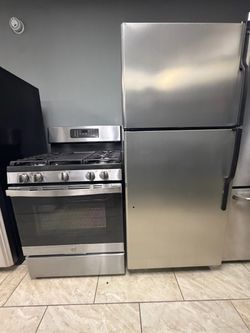 GE top freezer refrigerator &. GE 5 burner gas range set stainless steel