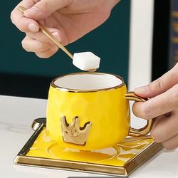 Gold and Yellow Crown Tea cup with saucer and spoon