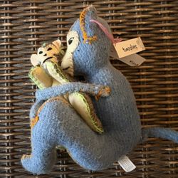 Twoolies handmade wool monkey with a baby.
