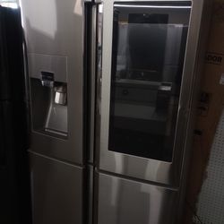 SAMSUNG STAINLESS STEEL 4 DOOR WITH TOUCHSCREEN AND ICE DISPENSER 