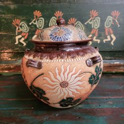 Vintage pottery bowl with lid
