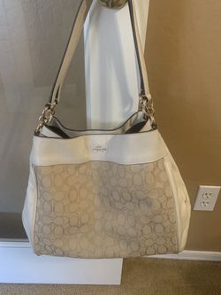 Coach purse cream color