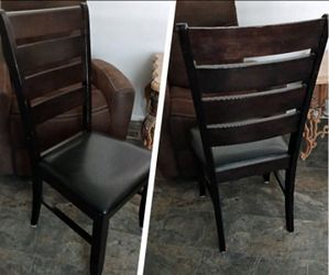 2 Solid sturdy dark wood chairs