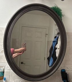 Oval bathroom mirror