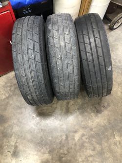 Three 14 inch trailer tires