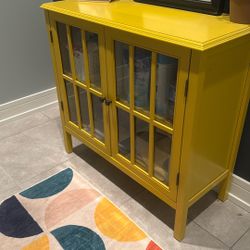 Yellow Storage Cabinet With Glass Doors 