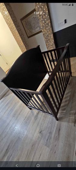 Dark brown baby crib