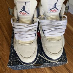 Midnight Navy Jordan 4s