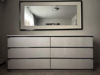 Bedside table with wall