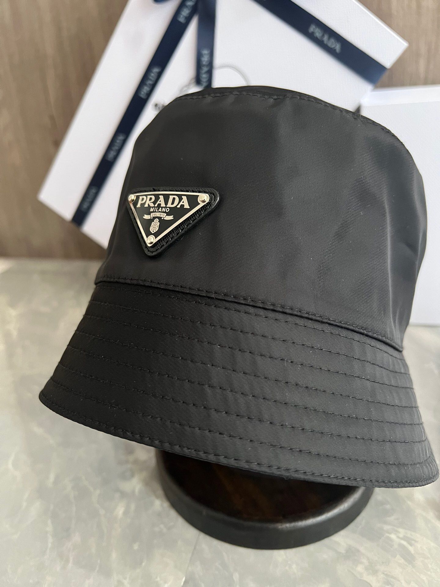 Prada bucket hats