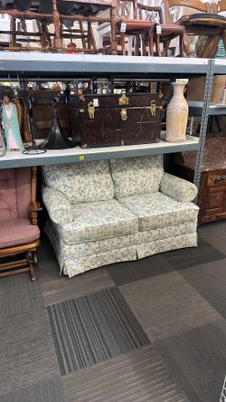 Floral cream sofa with blue flowers