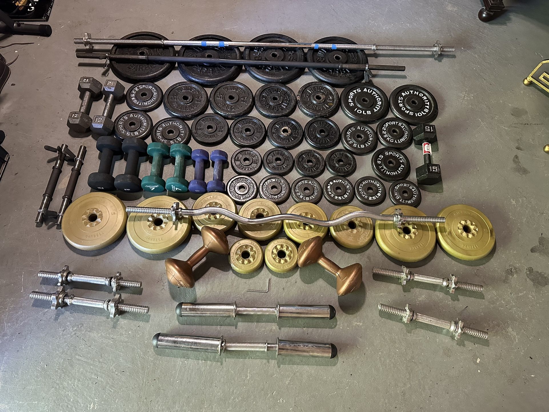 Weight Plates Dumbbells And Weight Lifting Poles