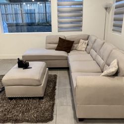 Brand new sand color linen sectional sofa with Ottoman and 2 accent pillows.