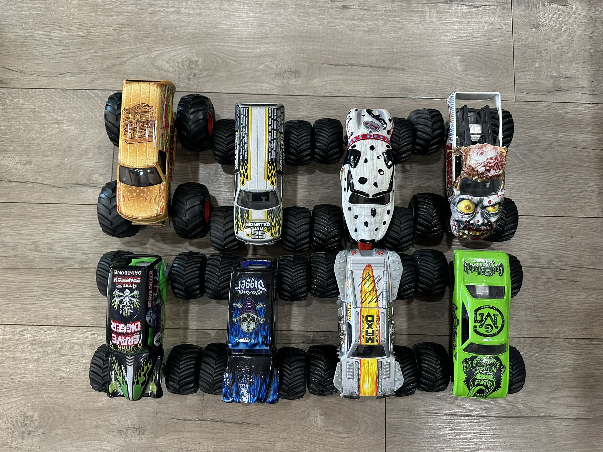 Set of 8 monster jam trucks from hot wheels. These are the bigger 1/24 scale trucks.
