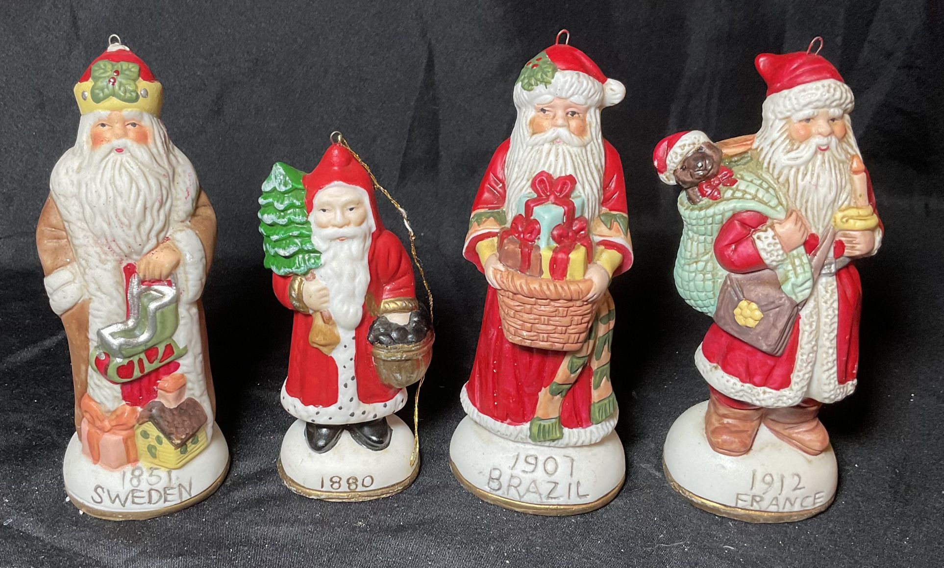 Vintage Christmas Bisque Ceramic Santa Claus Set Of 4