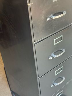 3 metal file cabinets