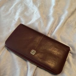 LOW PRICE MOVING- FENDI $990 + TAX RETAIL ZIPPY WALLET. 