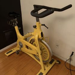 	•	Yellow SoulCycle Spin Bike – Ready for Home Workouts