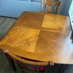 A Wooden Dining Table In Very Good Condition 