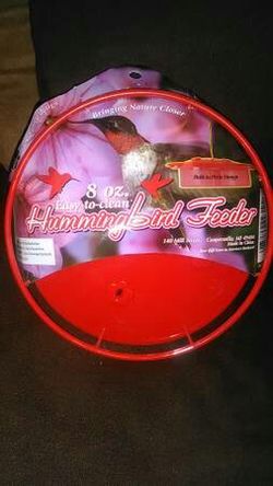Hummingbird feeder w/ built in pirch design* new*. - $2