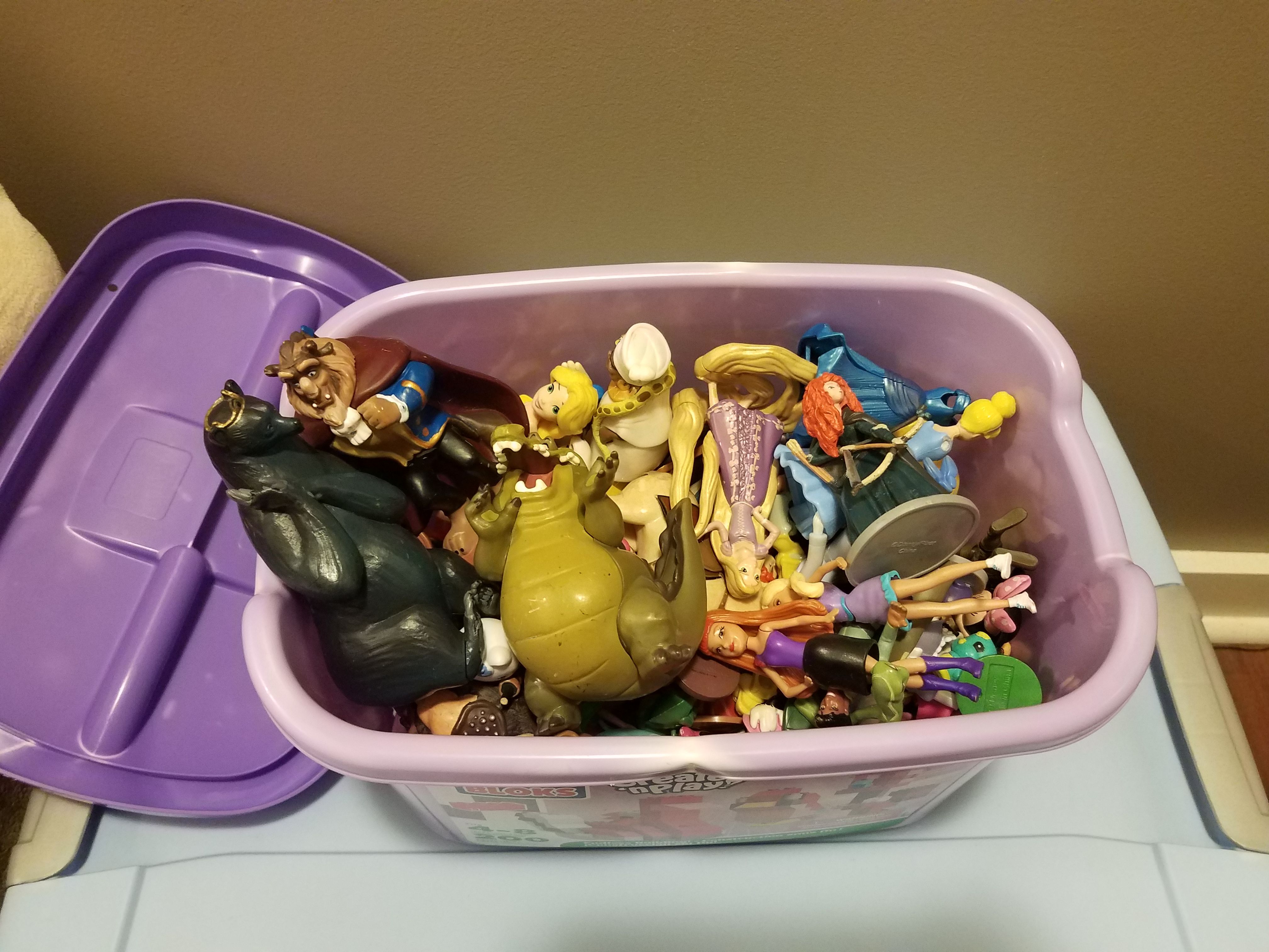 Bucket of Disney figurines