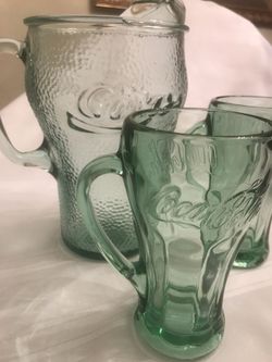 Coca Cola pÃtcher and two glasses