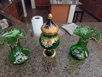 Crystal with gold candy dish in two vases. All three pieces two hundred dollars